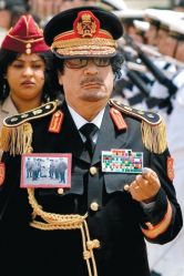 Каддафи впервые прибыл с офици ...