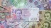 Налог на Россию: украинских артистов обложат оброком за гастроли (Гривны, купюры | REUTERS Konstantin Chernichkin) Гривны, купюры | REU…