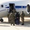 Кремлевская чистка в Дагестане: У власти сидела ОПГ (На фото: посадка задержанных по подозрению в мошенничестве членов правительства Дагестана в самолет …) На фото: посадка зад…