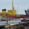 Berlingske: Восточная Украина — беднейшие задворки Европы (Рабочие в терминале Мариупольского порта | © AFP 2019, GENYA SAVILOV) Рабочие в терминале …