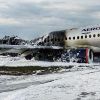 При пожаре на самолете в Шереметьево погибли 13 человек (Последствия возгорания самолета Sukhoi Superjet в аэропорту Шереметьево | © АГН Москва) Последствия возгоран…