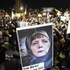 Немцы проклинают Меркель за разгул мигрантов (Фото: AP/ ТАСС) Фото: AP/ ТАСС