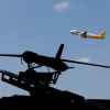 Русские РЭБ 'затрофеили' американский супер-пупер дрон ScanEagle (На фото: беспилотный летательный аппарат ScanEagle на пусковой установке Skyhook. (Фото: AP Photo/Bu…) На фото: беспилотный…