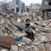 Остановит ли Трамп байденовские войны? (a child sitting on a pile of rubble description) a child sitting on a…