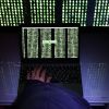 Вирус-вымогатель Petya атаковал российские и украинские компании (Хакер за компьютером. Архивное фото) Хакер за компьютером…