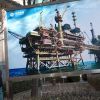 Убить нефтедоллар. Китайская мечта вот-вот сбудется (Баннер с изображением китайской нефтяной платформы компании CNOOC в Пекине. Архивное фото) Баннер с изображение…