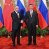 Россия и Китай договорились вывести сотрудничество на 'новый уровень' (Президент РФ Владимир Путин и председатель КНР Си Цзиньпин) Президент РФ Владими…