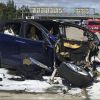 Внезапная смерть: Tesla может обанкротиться уже в марте (Потушенный после аварии автомобиль Tesla) Потушенный после ава…