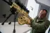 Из чего стрелять в XXI веке (Пулемет РПК-16 на стенде концерна Калашников | Фото: Евгений Биятов / РИА Новости) Пулемет РПК-16 на ст…
