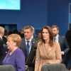 Меркель поднимает ставки перед встречей в Париже
