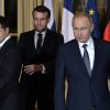 Гордон (Украина): на переговорах лидеров 'нормандской четверки' сидел сотрудник личной охраны Путина с пистолетом (Президент РФ Владимир Путин и президент Франции Эммануэль Макрон и президент Украины Владимир Зеленс…) Президент РФ Владими…