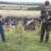 Странные интервью Стрелкова. Его боец о том, кто же сбил МН-17 (На фото: место крушения самолета Boeing 777 в Донецкой области (Фото: AP/TASS)) На фото: место круше…