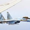 'Ваня, бей, а я прикрою': Американцы возмущены 'безрассудностью' российских пилотов (На фото: российский истребитель Су-35 (по кодификации НАТО — Flanker-E) во время перехвата самолета-…) На фото: российский …