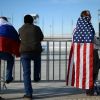 Дипломат о действиях США против России: они плохо кончат (Болельщики с флагами России и США в Олимпийском парке в Сочи | © РИА Новости, Константин Чалабов) Болельщики с флагами…