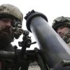 ДНР: Украинские силовики попытались прорваться на севере Донецка (Украинские военнослужащие с минометом. Архивное фото) Украинские военнослу…