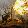 Без оглядки: решающая стадия войны (© РИА Новости . Евгений Биятов / Боевая работа расчета 2С7М Малка ЦВО на Красноармейском направлении) © РИА Новости . Евге…
